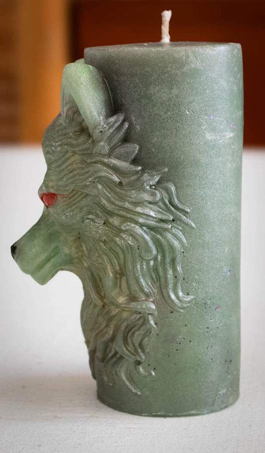 Embossed Wolf Head Pillar Candle — Sage Green with Crimson Eyes